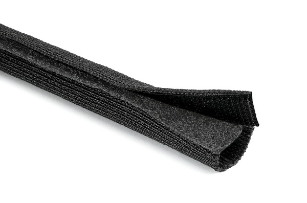 Calza trecciata protettiva in poliestere elastica con chiusura Velcro per cavi industriali e applicazioni post terminazione